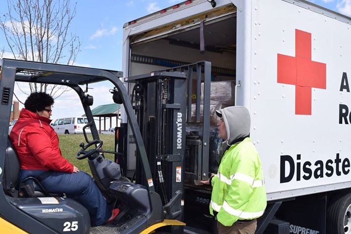 Loaitza's tweet photo. #DisasterInstitute instructor Joe Cirillo teaches me how to operate a Forklift. Not a dull moment at the #RedCross https://t.co/Y3JsApTfyE