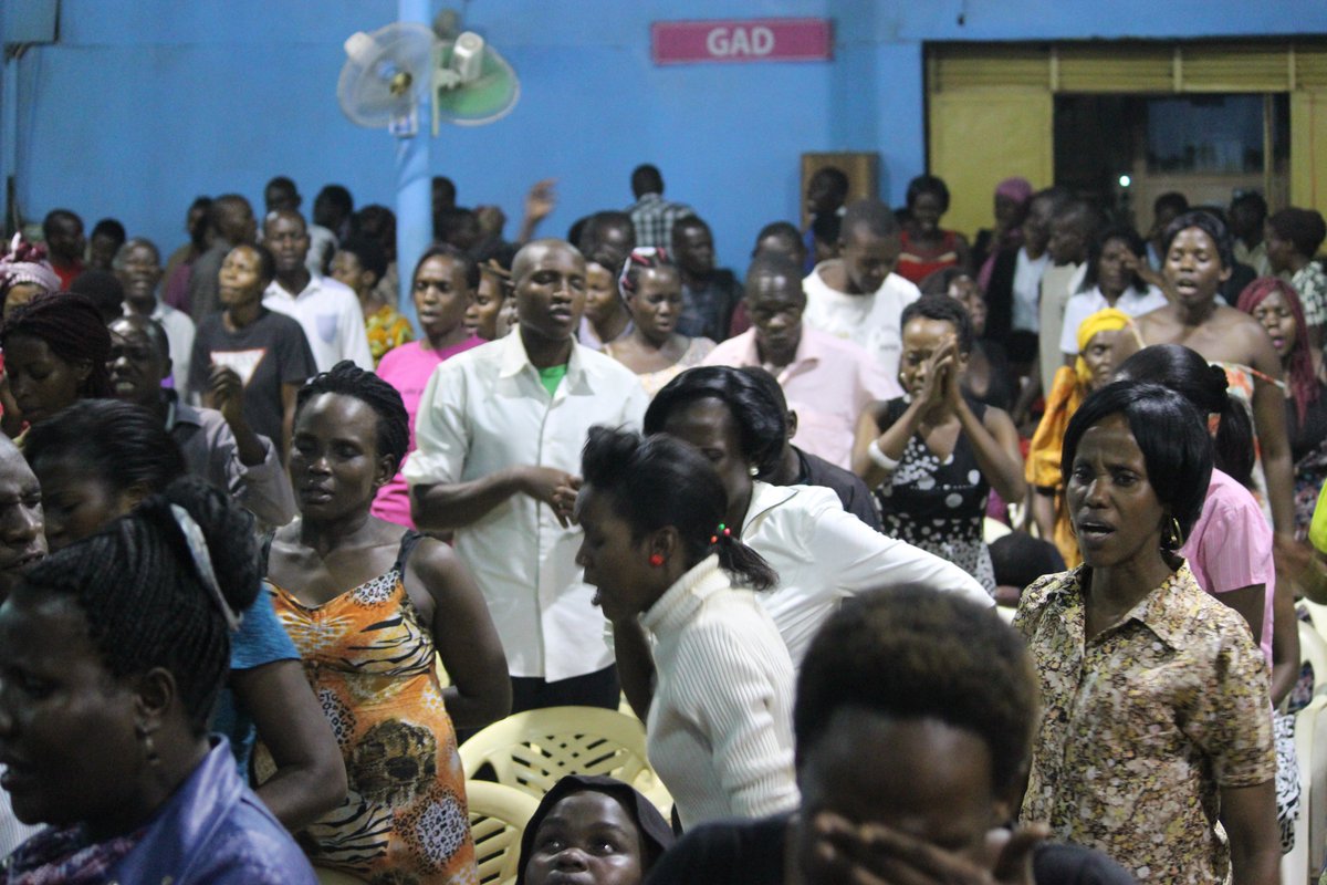kingdomTv_ug's tweet photo. People in the #mukutulaNjegere service around breaking off their chains even before the big bread of the night. https://t.co/7L7eJOGG7d