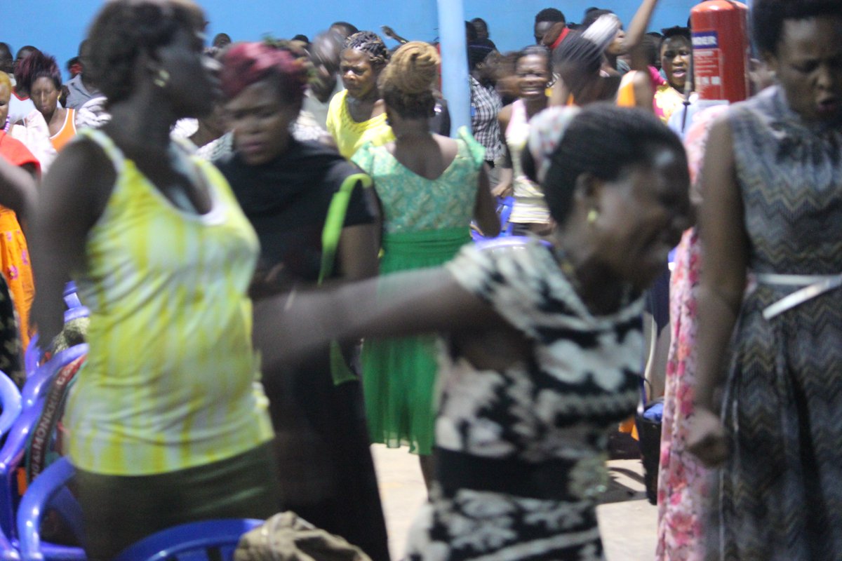 kingdomTv_ug's tweet photo. People in the #mukutulaNjegere service around breaking off their chains even before the big bread of the night. https://t.co/80UFmeLWmZ