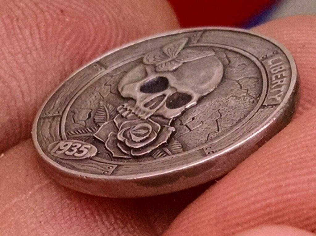 HoboShane's tweet photo. Latest carving I did #hobonickel #skull #rose @HoboShane https://t.co/O1Kj6HD3Yt