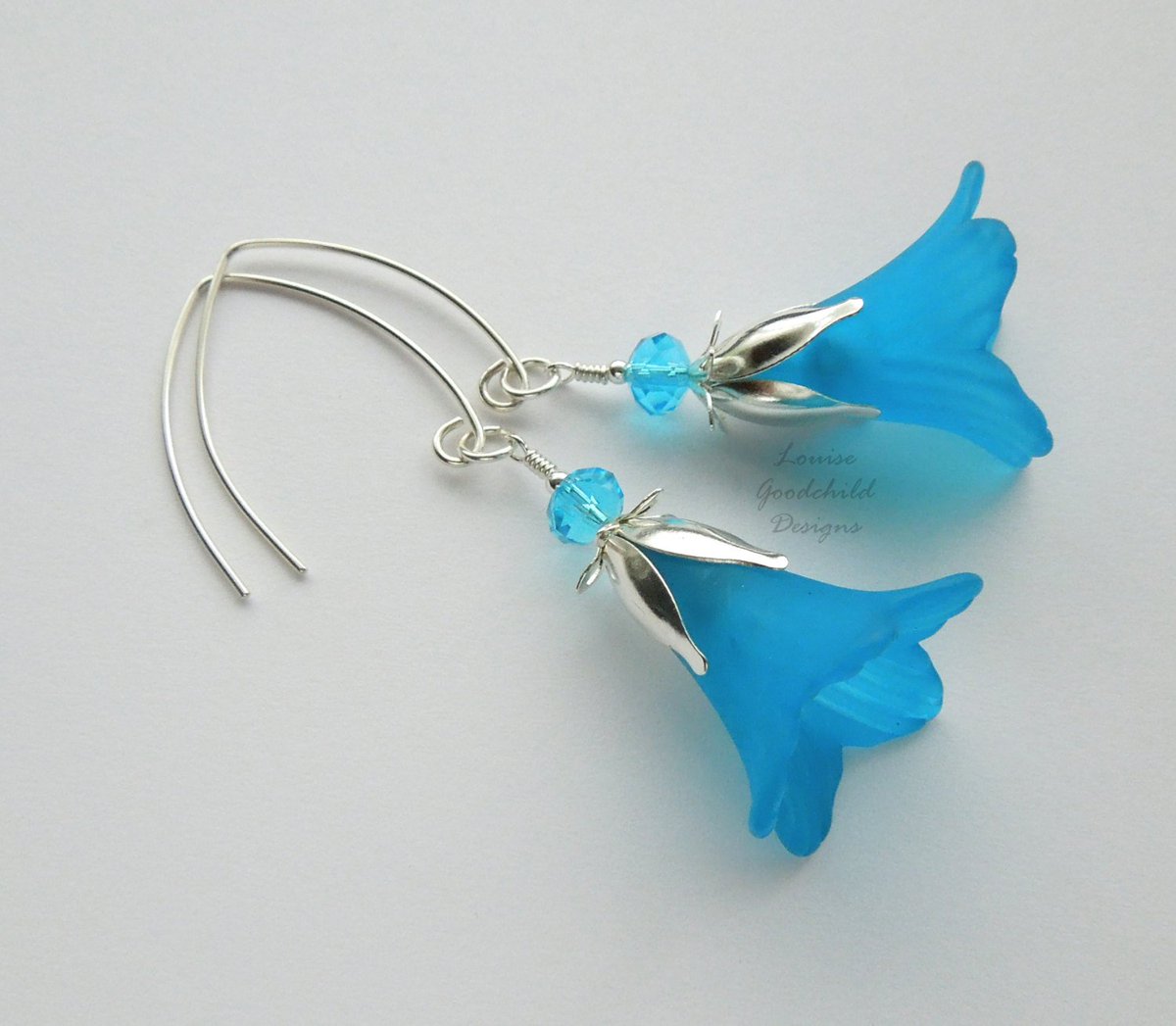 LouiseGDesigns's tweet photo. Turquoise lily earrings, turquoise flower earrings, turquoise and si⦠https://t.co/axfzAslRLo #Etsy #TurquoiseFlower https://t.co/5UZQ5ZVpvh