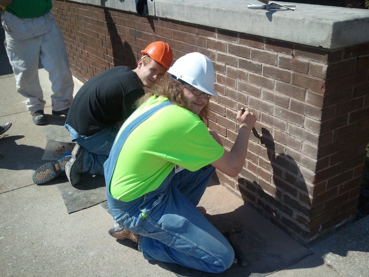 CPACTC's tweet image. Masonry students taking advantage of spring weather to repair school wall #cpavts #masonry #inhouserepairs