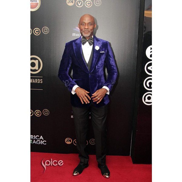 The Boss of Nollywood Richard Mofe Damijo ,still proving his might on the REDCarpet @#AMVCA2016..2 hands in D AIR.