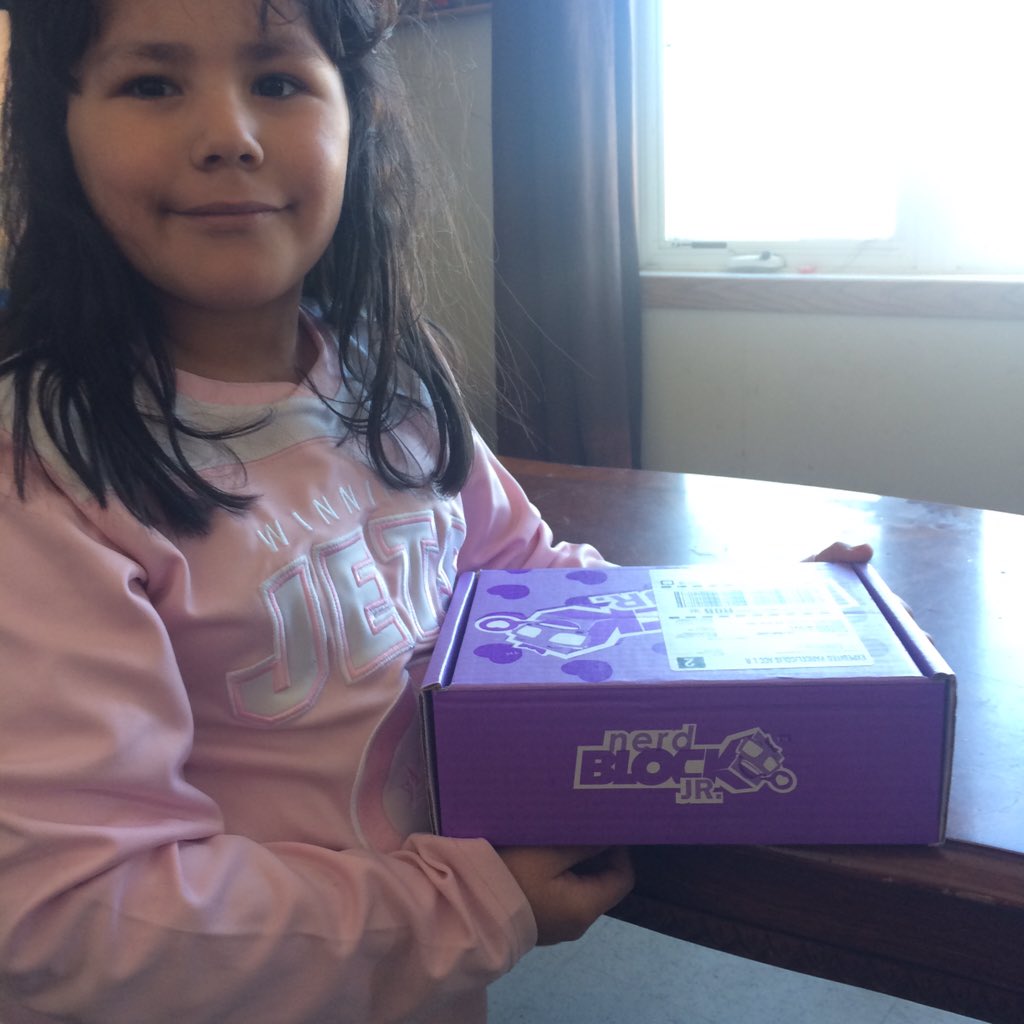 Arejayem15's tweet image. My daughter with her first #NerdBlockJr.... She&apos;s so happy. Thank you @NerdBlock ☺️