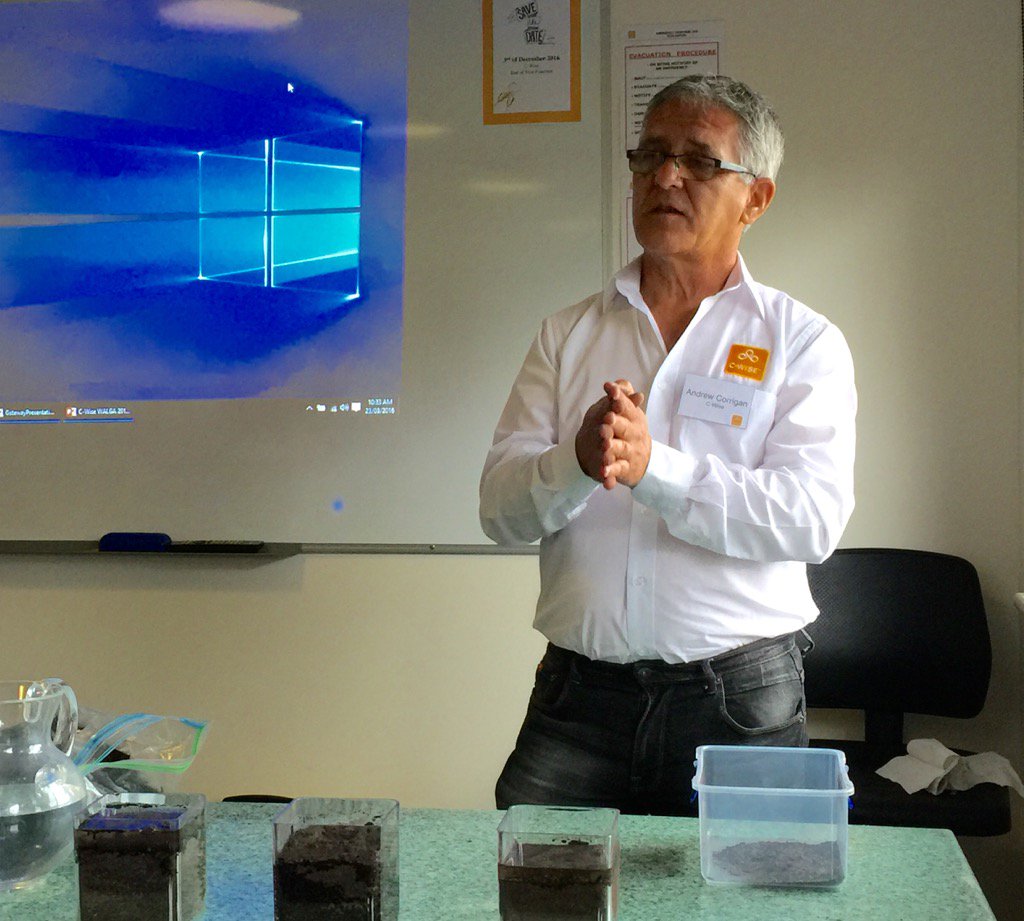 Andrew Corrigan shows water absorption in sand with and without composted soil improvement <a href="/CWiseAustralia/">C-Wise</a> open day