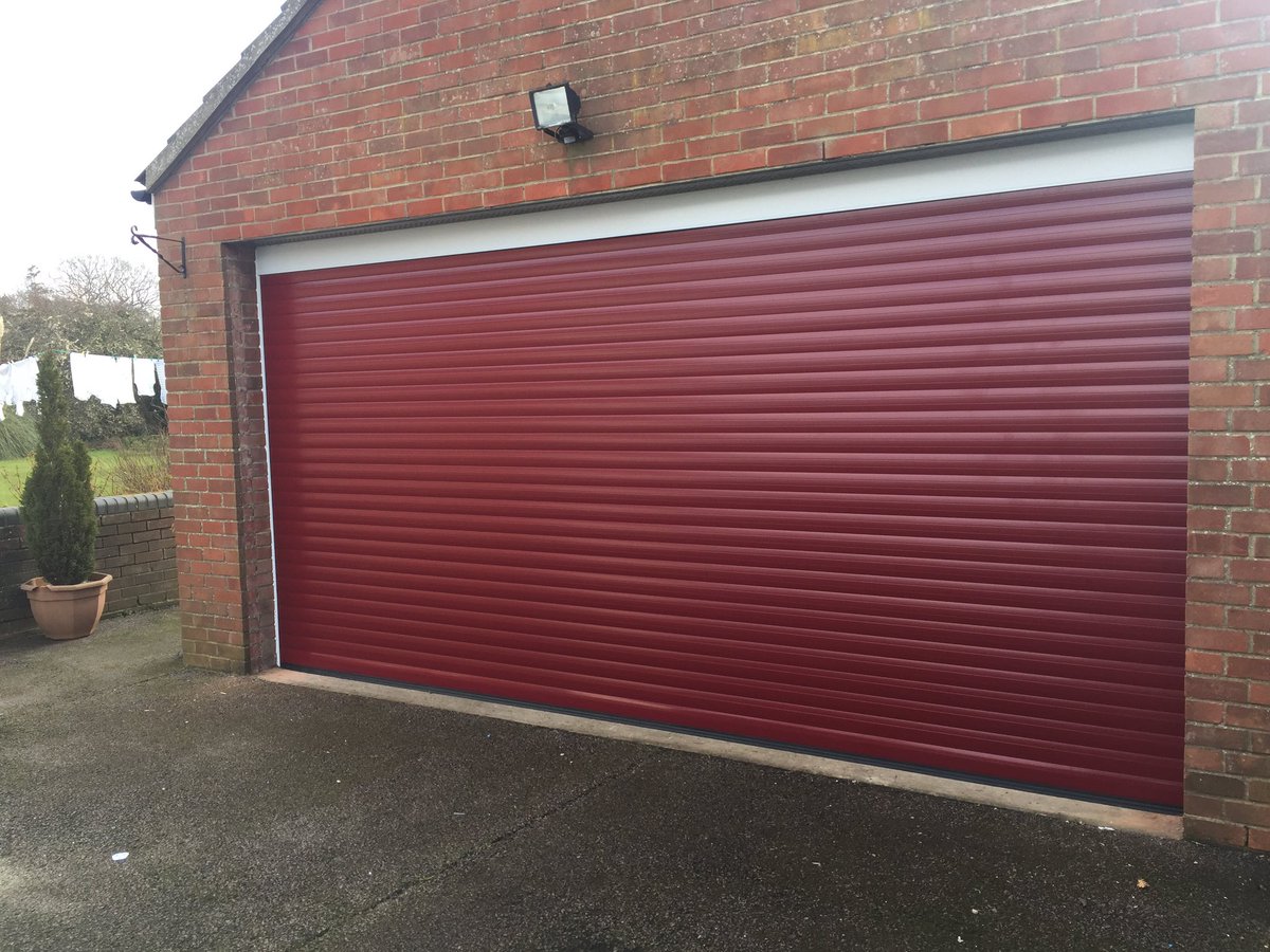 YLGDMLtd's tweet photo. Old red double up and over out and lovely new red roller door with white surrounds fitted https://t.co/0o4jZOT3bN