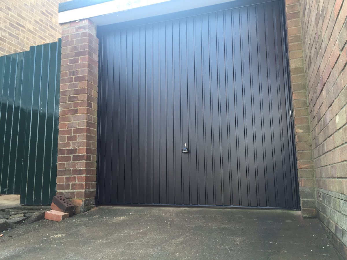 YLGDMLtd's tweet photo. Old up and over out and new black garador up and over fitted https://t.co/qF2SFPvdQ7