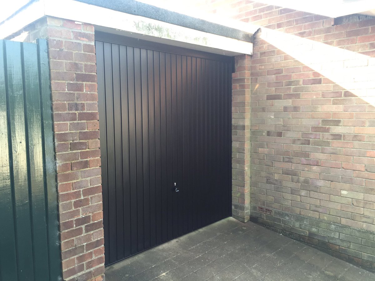 YLGDMLtd's tweet photo. Old up and over out and new black garador up and over fitted https://t.co/qF2SFPvdQ7