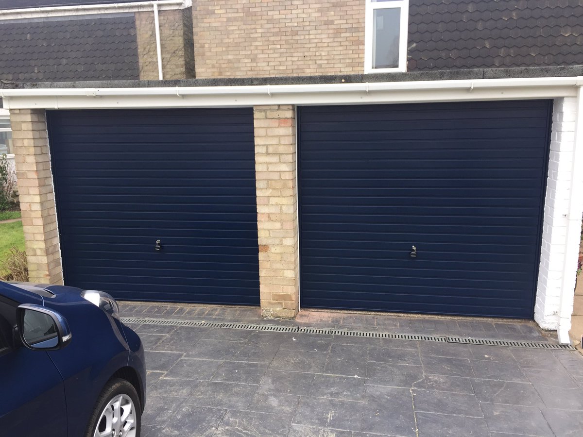 YLGDMLtd's tweet photo. Two old up and over doors out and two lovely new steel blue up and overs fitted https://t.co/l0WfSHT8G6