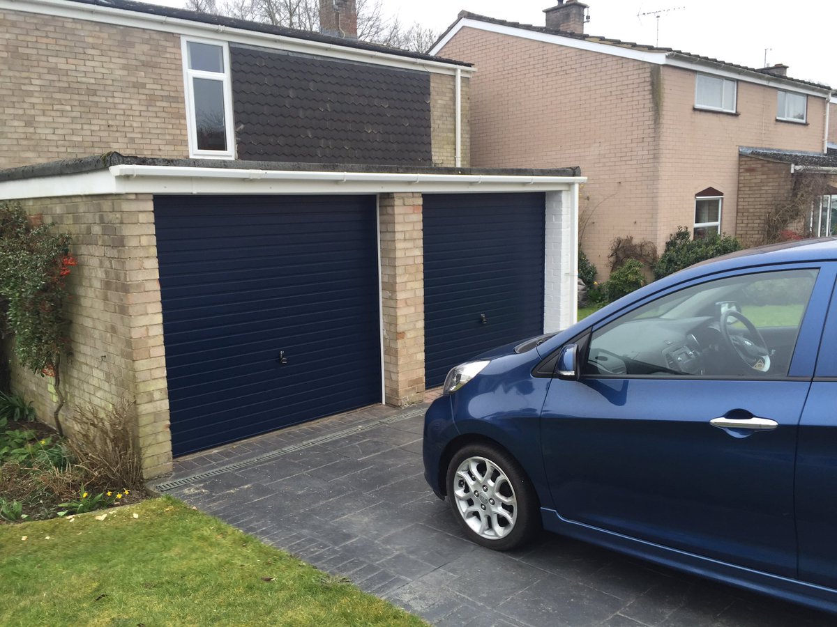 YLGDMLtd's tweet photo. Two old up and over doors out and two lovely new steel blue up and overs fitted https://t.co/l0WfSHT8G6