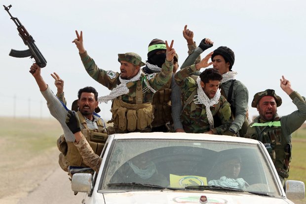 thetimes's tweet image. A powerful Shia militia in Iraq has threatened to attack US forces thetim.es/25khFnK