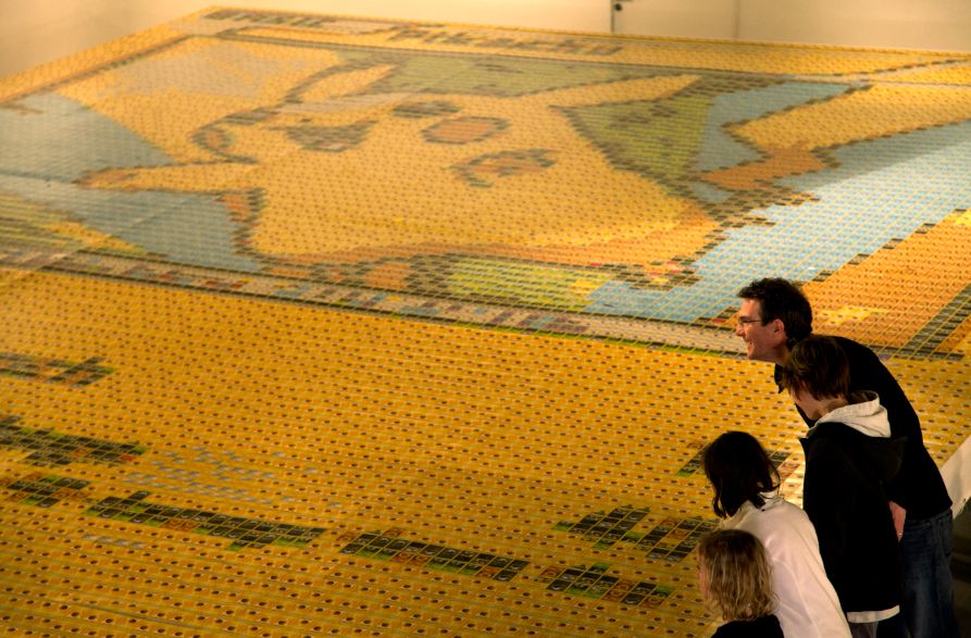 GameSpot's tweet image. Check out this 30-foot Pokemon card mosaic made out of 12,987 individual cards. l.gamespot.com/1VAaL9N