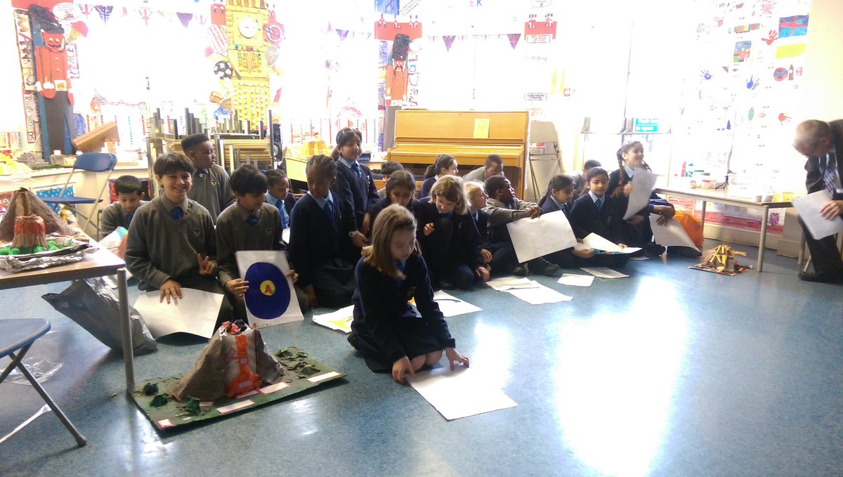 Form V are preparing to perform their Volcano Assembly to the rest of the school...