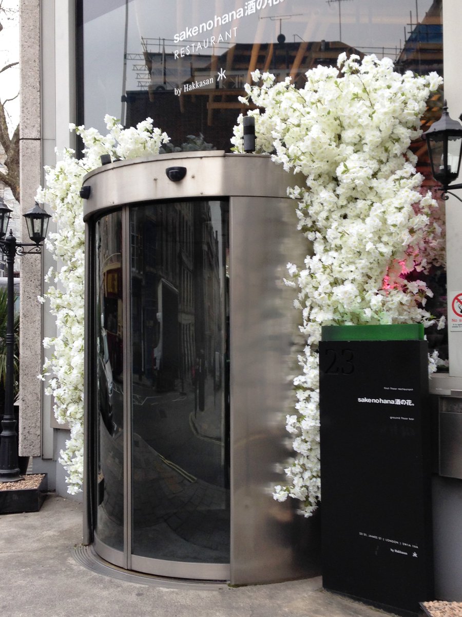 horneharvey's tweet photo. You know spring is coming when our neighbours Sake No Hana have their blossom on display #stjames #springtimelondon https://t.co/jqO0JMeDkB