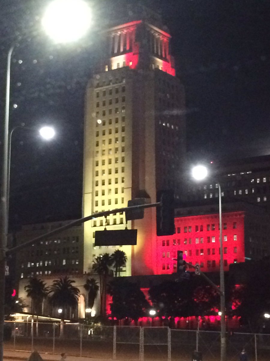 Claudia_Botero's tweet photo. LA city hall lights up with the #belgianflag in honor of the #BrusselsAttacks @NU34LA https://t.co/u4sLVTpvRd