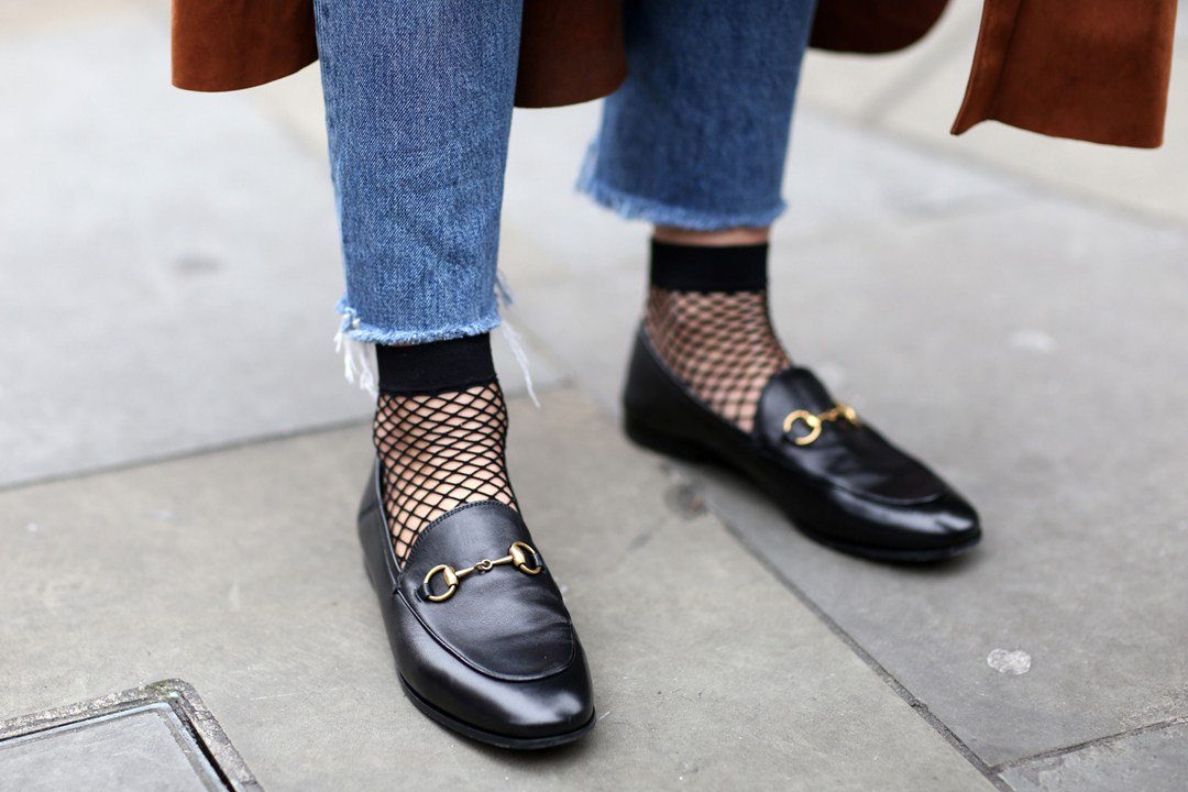 BritishVogue's tweet photo. Would you wear fishnet socks? Discover Miss Vogue’s pick of trends to try now: https://t.co/2NimYbpWov https://t.co/8luEhnFIsW