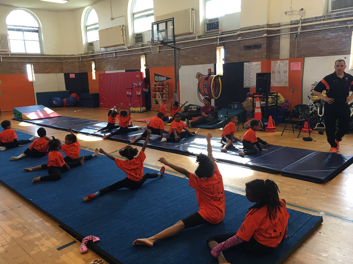 LangSTEMPrincip's tweet photo. Gymnastics Club @LangleySTEM warming up for some tumbling, pyramids, and cartwheels! #DCPSRising https://t.co/jCCrqnBUZH