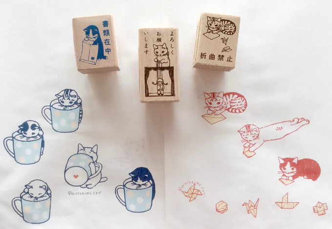 こないだ買った猫ハンコと紙袋　かわいい… 