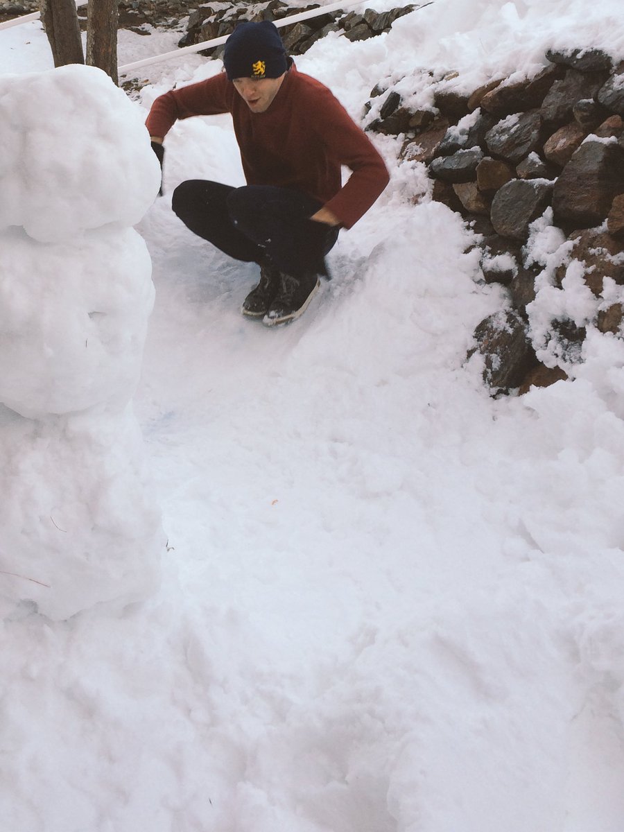 Sliding down our awesome snow slide. #blizzardsaregreat #daddydaughter