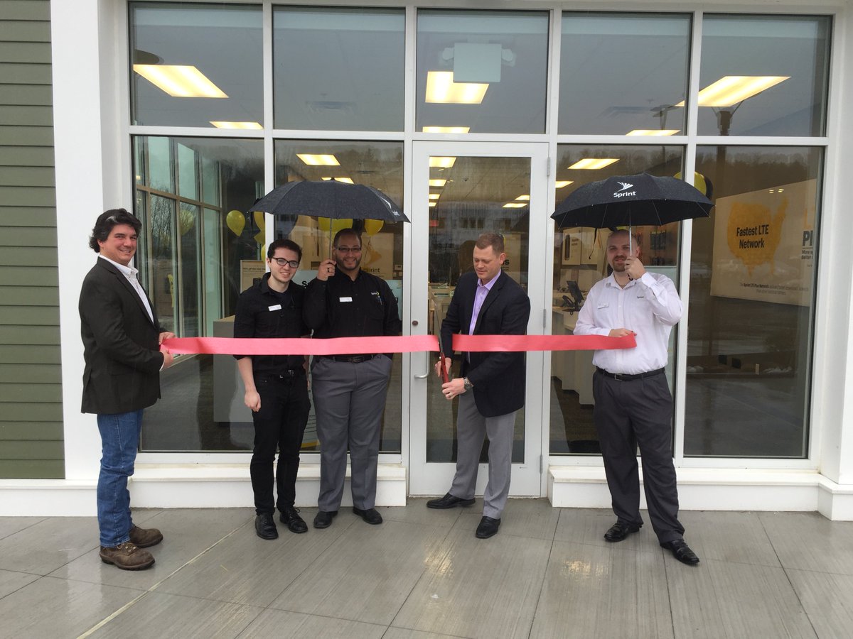 sprintlittleton's tweet image. May be raining, but our new store shines brighter than the sun for the Ribbon Cutting in Littleton MA @marceloclaure