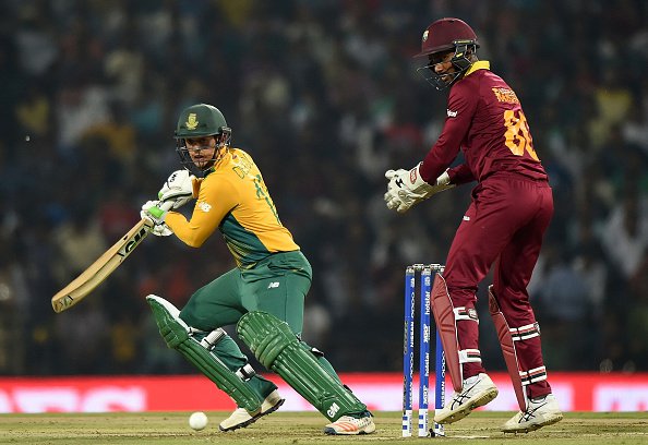 BBCSport's tweet photo. WICKET!
It's a big one for #WI as Quinton de Kock is bowled for 47

#SA 97-6 
https://t.co/FCATm4Gzyv #SAvsWI #WT20 https://t.co/2wtOp2AsfZ