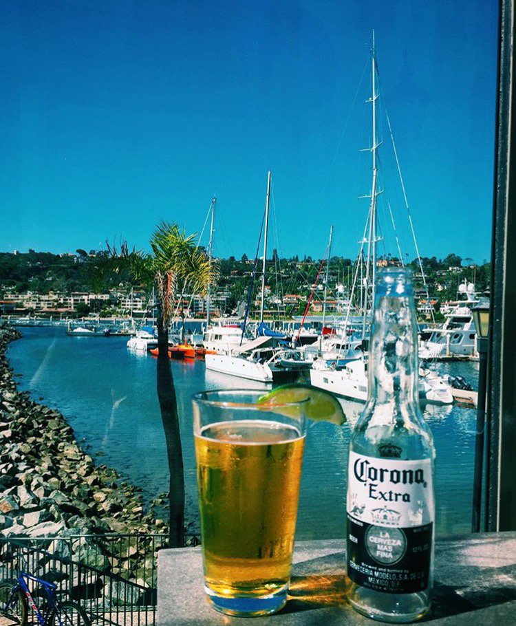 Join us for #happyhour and enjoy the view of the marina.  #fridayfeeling #vesselsandiego #shelterisland #TGIF