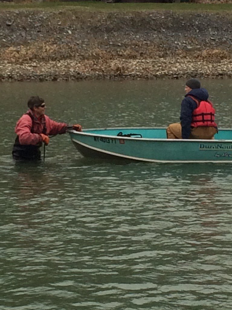 CornellRowing's tweet photo. Prepping for the first race. #waders #chestdeep #ItsAWaterSport #TPK2 @CornellSports @usrowing https://t.co/sRRLJ0WUjZ