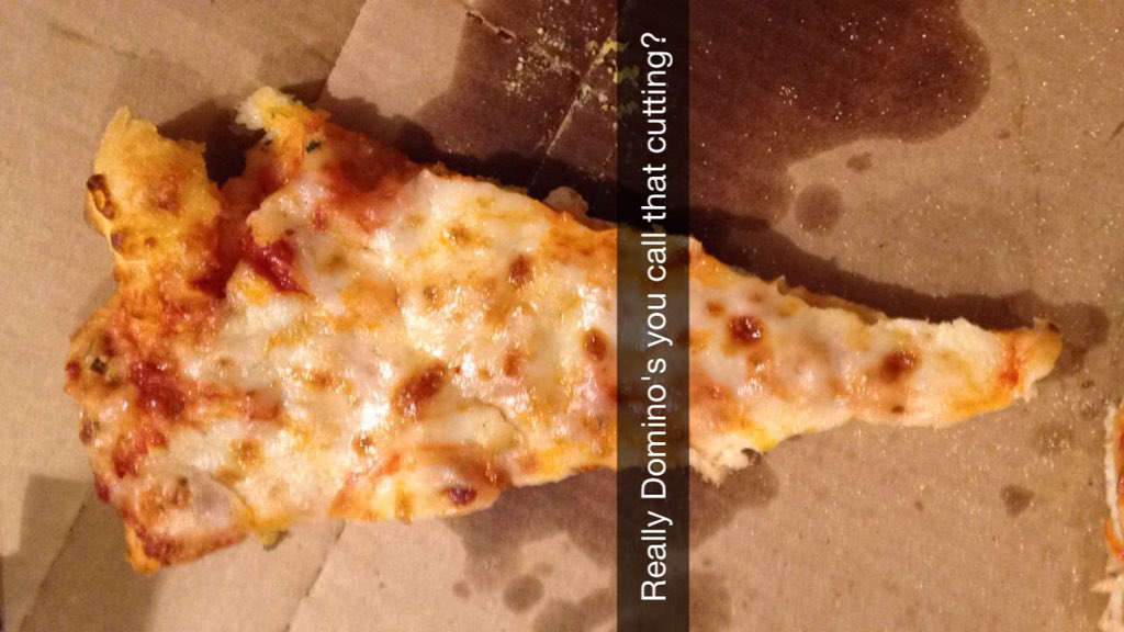 OmarNWasHere's tweet photo. What kind of cutting is this?! @dominos https://t.co/0H63BCO6Yu