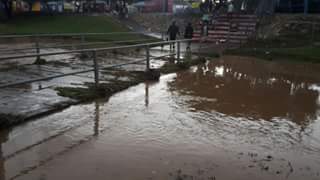 FlaggAid's tweet image. #oudtshoorn. Foot bridge flooded at Stears Rivierbuurt #KKNK2016. Camping tents totally wet @Sfmstreek. @zarsg
