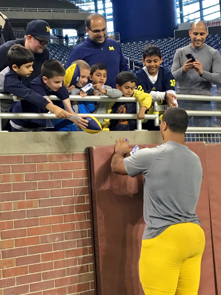 UMichFootball's tweet photo. Even after a 4 hr practice and meeting with media, Chris, Jourdan and De'Veon have time to greet young fans! #GoBlue https://t.co/I7RXbt0q6p