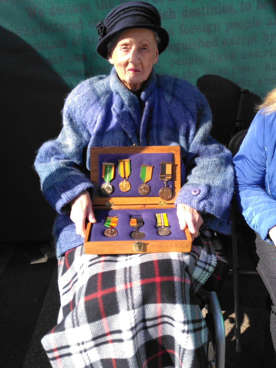darraghdoyle's tweet photo. Sheila O'Leary, 94, holding medals of her parents Thomas Byrne and Lucy Smith, who fought in the GPO #Ireland2016 https://t.co/JOTypngNv7