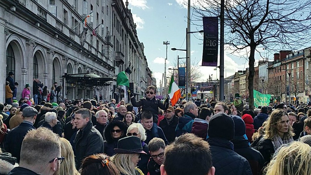 DublinTown's tweet image. One young man enjoying the parade today. #2flags #Ireland2016