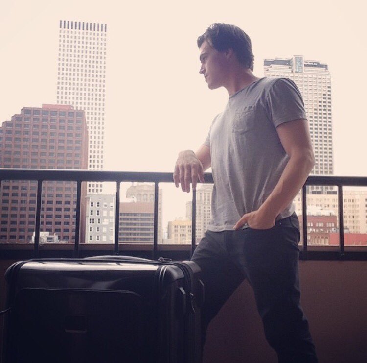 Dramatically staring out.