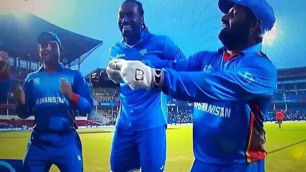 AhmadShuja's tweet photo. Major kudos to Chris Gayle for celebrating w/ Afghanistan its world cup upset over his own side. Big guy, big heart https://t.co/PzJCUsCf6f