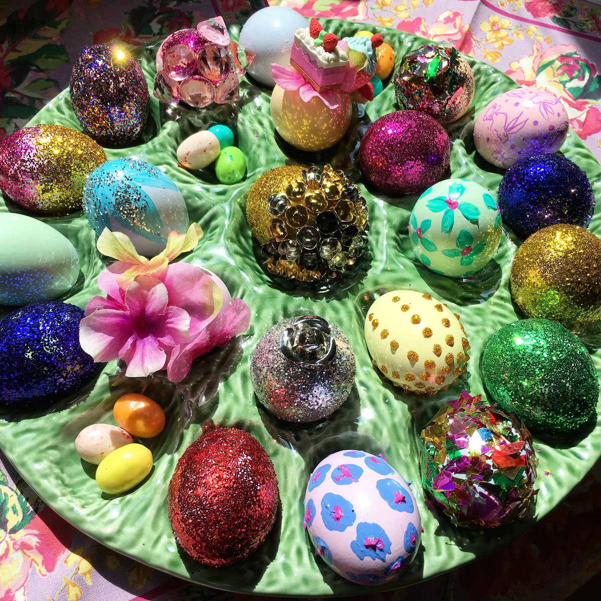 CSiriano's tweet photo. Decorated #Easter eggs today with my mom @sirianoj and @bradwalsh! Glitter, petals, crystals, and cakes! 🌸🌷🐰🌺💐🍰🍡🎀🎉 https://t.co/thl43vuCoH