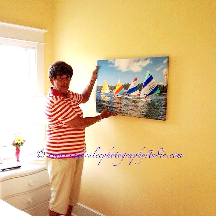 Client hanging her new #customcanvas. #northernmiart #artstudio #artgallery #petoskeyartgallery #sailingart #wallart