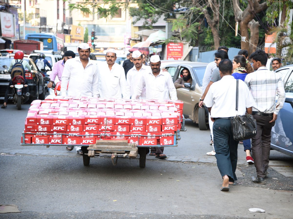 KFC_India's tweet photo. Mumbai Dabbawalas become #KFCBoxwalas to deliver a surprise: The new KFC 5-in-1 Meal Box, just at Rs 149*! https://t.co/8tRhpwSut6