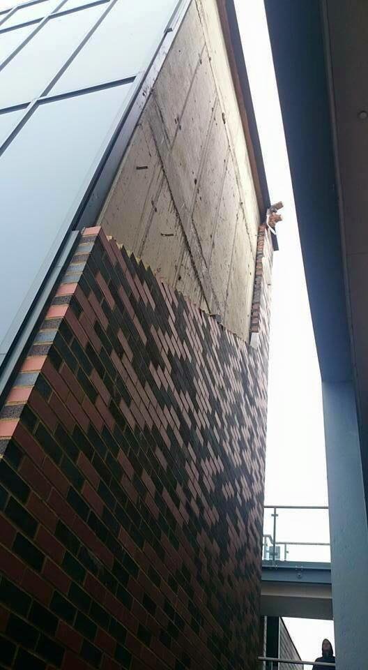 Kent_999s's tweet image. CRAYFORD: A wall at newly built flats at Townhall Square off Crayford Road was blown down by the wind this morning.