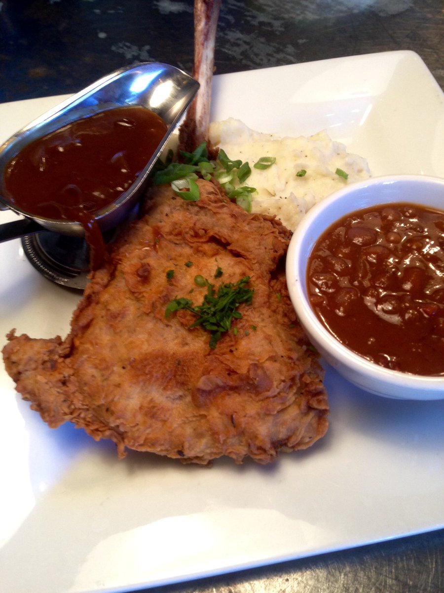 Fried Tomahawk Pork Chop, baked beans, mash potatoes #libertykitchen #lkhh #houheights #porkchop