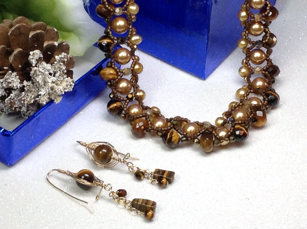 synergemz's tweet photo. Tiger by Night @synergemz #TigerEye #FreshwaterPearls #CzechCrystals #SwarovskiCrystals https://t.co/xuC7NJp0lI https://t.co/j80GOjC0fd