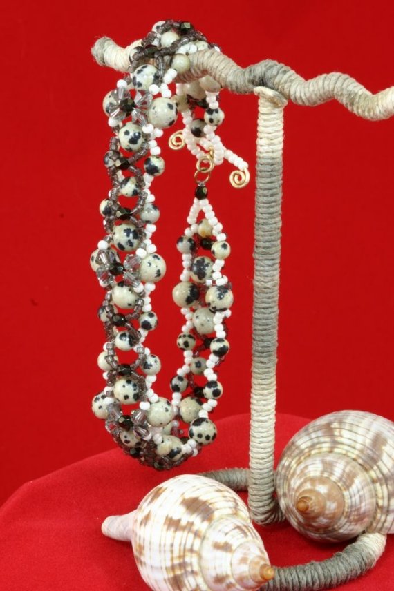 synergemz's tweet photo. Dalmatian Flower Bracelet by @synergemz #DalmatianJasperBeads #SwarovskiCrystals https://t.co/FS9TLfW83J via @Etsy https://t.co/xhWqAnhCtz