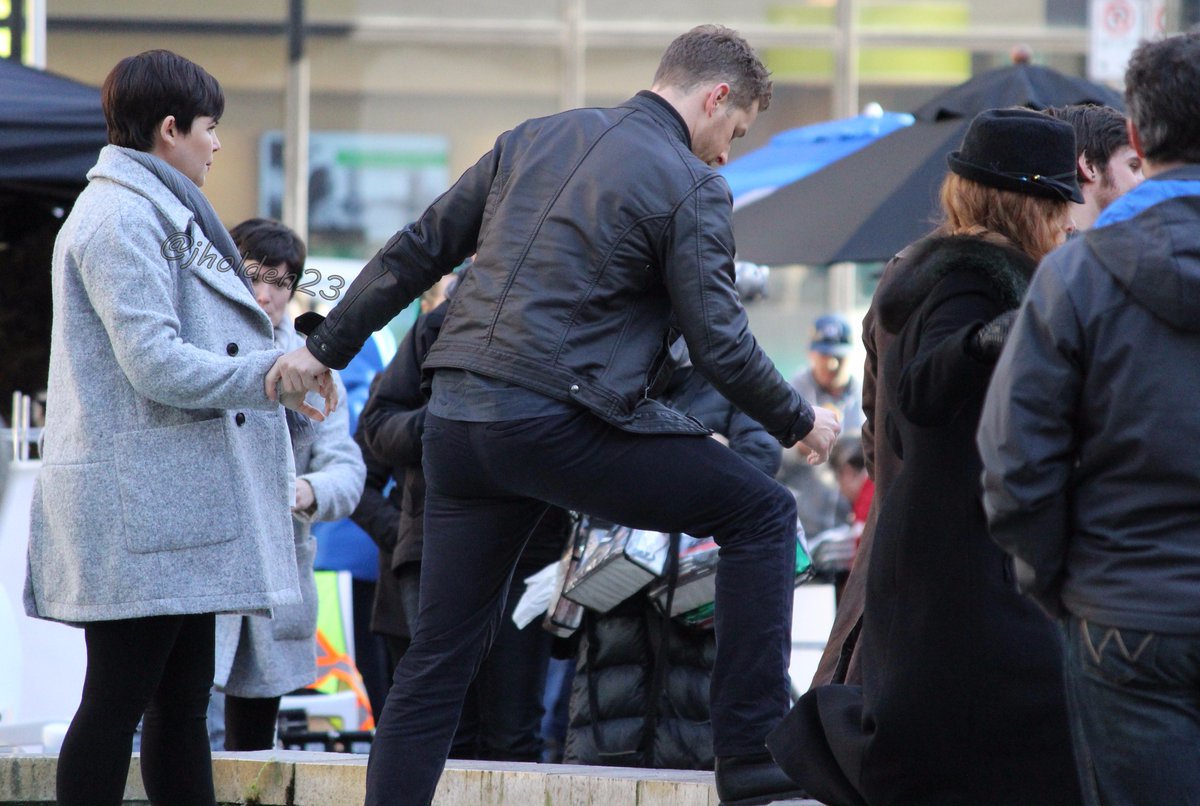 jholden23's tweet photo. #JoshDallas showing off his #Starucks-drinking,Charmings holding hands and #MJo between takes today on the #OUAT set https://t.co/W9nKgqjwyh
