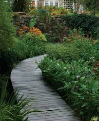GardenDiy's tweet photo. Primarily functional pathways add interest and invite you to explore the garden. #GardenDesign #GardenPathways https://t.co/NlxwQ3fzts