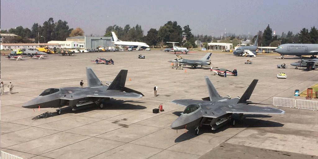 LockheedMartin's tweet photo. Two #F22 Raptors take the stage at FIDAE! Stay tuned for more #avgeek photos from the show: https://t.co/RCw3E2f4RE https://t.co/9pgYyzfQyW