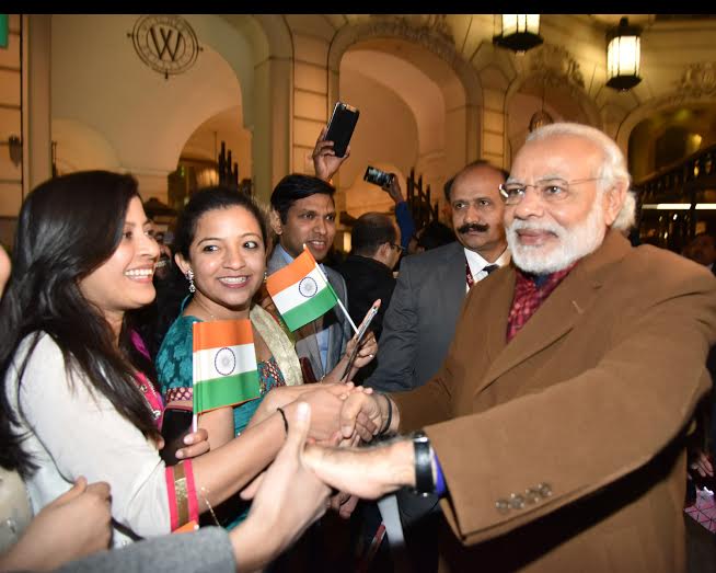 TimesNow's tweet photo. PM Narendra Modi being welcomed by people of Indian community, on his arrival at Brussels, Belgium #ModiInBrussels https://t.co/PAvKAp3QT4