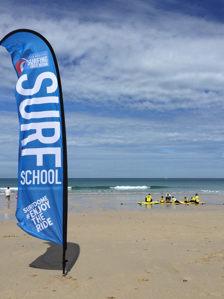 SurfingEngland's tweet photo. St Ives looking all St Ivesy today @stivesurfschool โ๏ธ #NiceFlags #BritishSurfSchoolScheme @Surfdome https://t.co/Rqc443TLty