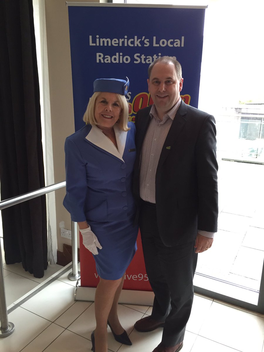 Live95Limerick's tweet photo. MaryLou Bigelow dressed in a copy of her original PanAm Airlines Airhostess outfit @LimerickStrand with Joe https://t.co/SL07rCqcdB