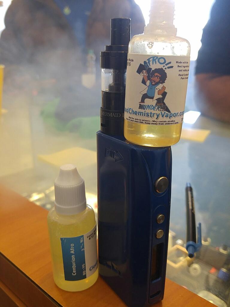AfroThunderCC's tweet photo. Look how far @cloudchemistry has taken me! My own logo and my 100th houseblend! Centurion Afro #vapelife #vapefam https://t.co/5i1Lr4o8v9