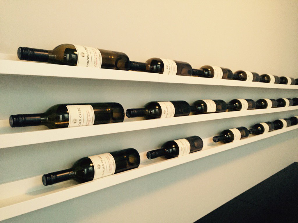 AMREdmonton's tweet photo. Favourite install yet! @IKEA #RibbaPictureRail turned #winerack at @CoventryHomes #CyBecker #Showhome #winelover https://t.co/9lrFnCcwBJ