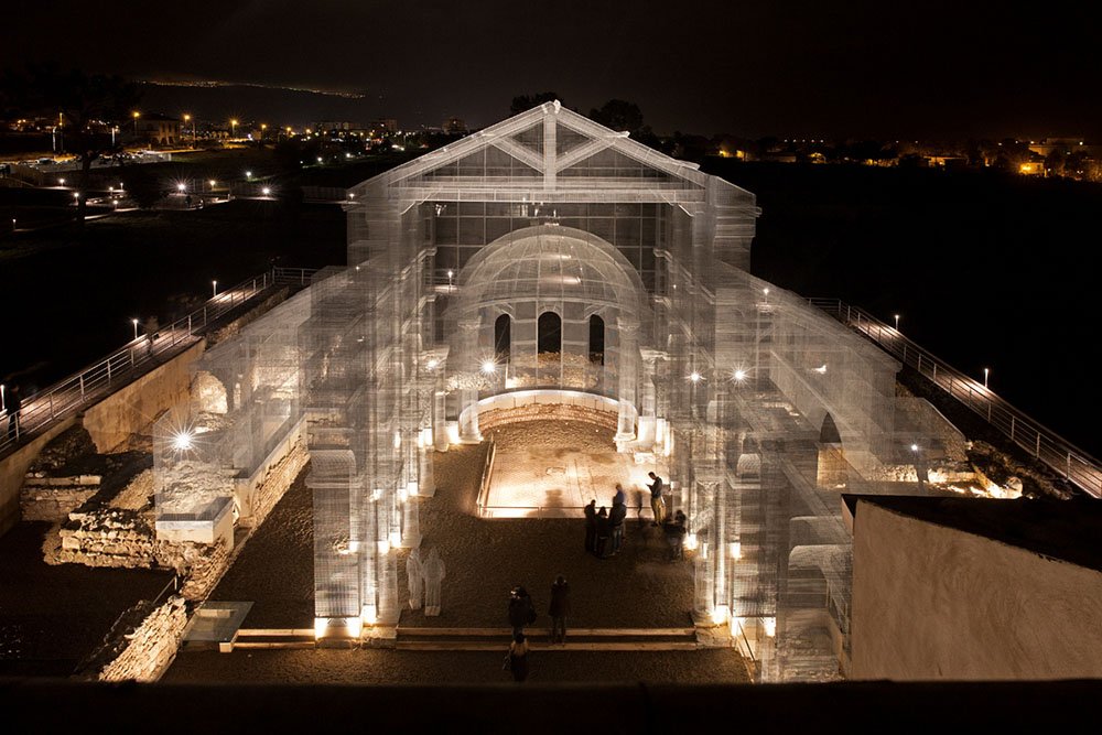 With hundreds of yards of wire mesh artist Edoardo Tresoldi has built a church at Park of Siponto, Italy.